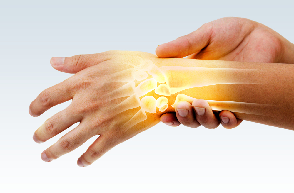 Translucent skeletal illustration indicating hand and wrist pain